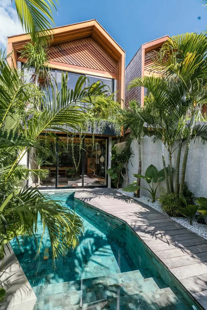 Sandara private villa pool surrounded by tropical plants